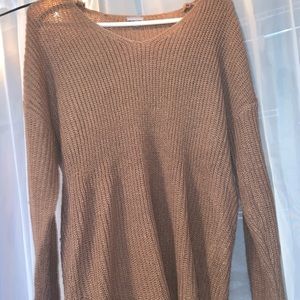 Knit brown sweater.